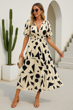 Robe longue à manches bouffantes imprimé géométrique | Plusieurs couleurs | Élégante et audacieuse pour toutes vos sorties