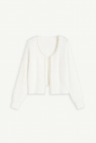Cardigan en maille duveteuse | Coupe droite | Bordures perlées | Élégance douce
