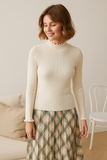 Pull Col Roulé à Volants | Doux & Élégant | Maille Chic