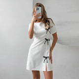 Robe Mini à Nœuds Contrastés | Noire | Élégante, Ludique et Originale