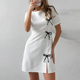 Robe Mini à Nœuds Contrastés | Noire | Élégante, Ludique et Originale