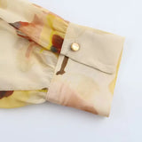 Blouse en mousseline fleurie avec nœud | Multicolore | Élégance florale et légère