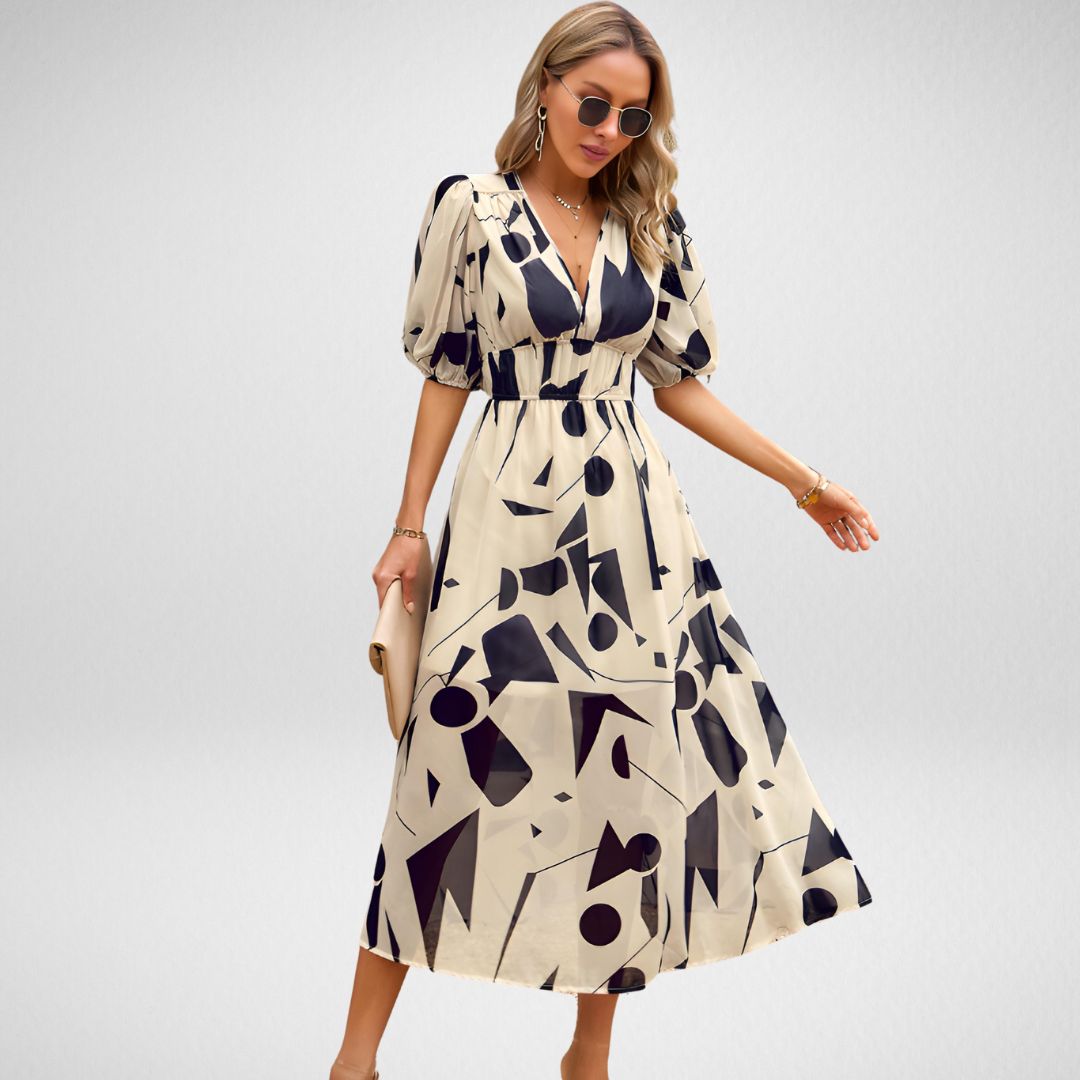 Robe longue à manches bouffantes imprimé géométrique | Plusieurs couleurs | Élégante et audacieuse pour toutes vos sorties