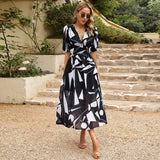 Robe longue à manches bouffantes imprimé géométrique | Plusieurs couleurs | Élégante et audacieuse pour toutes vos sorties
